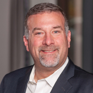 Professional headshot of Jason Brafman
