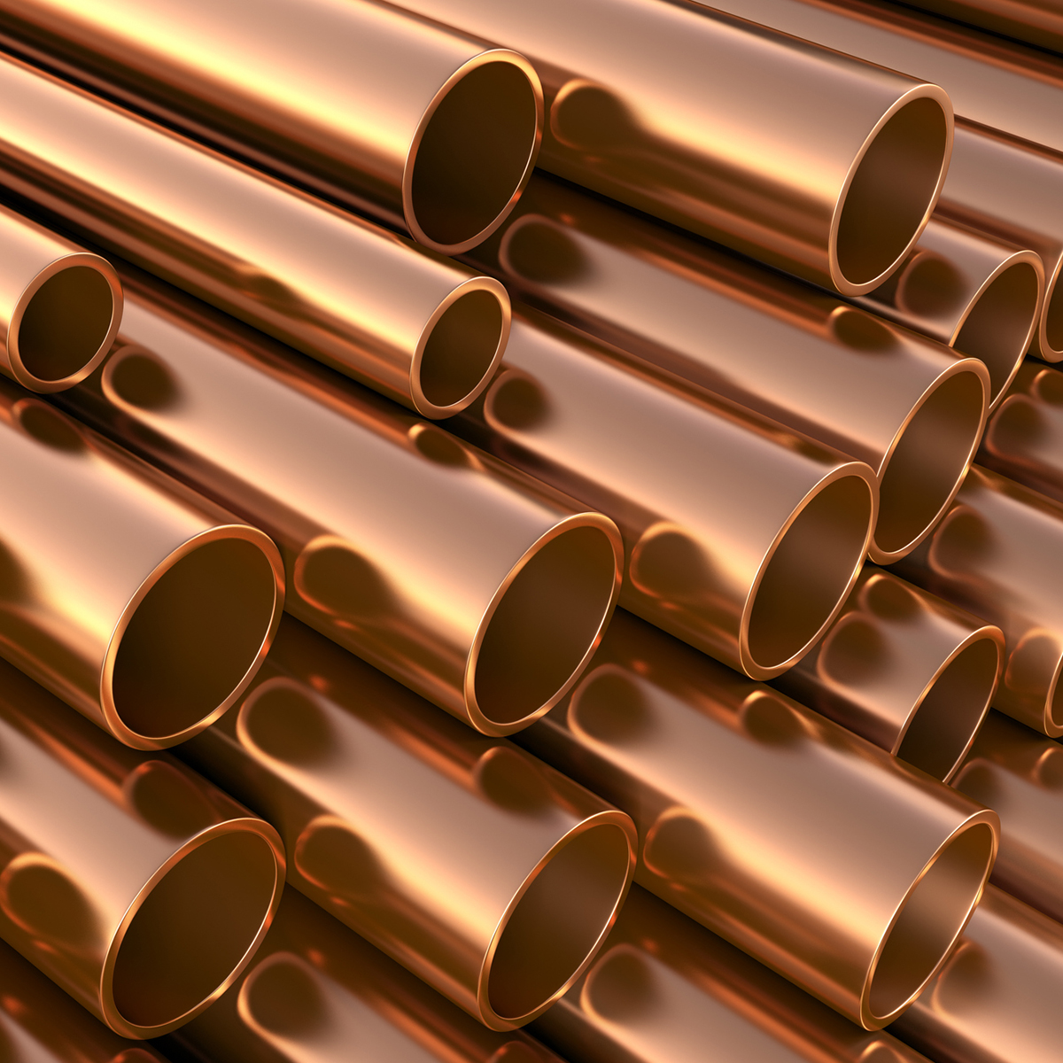 Industrial setting featuring steel and iron pipes and tubes arranged against a neutral background, highlighting construction materials.