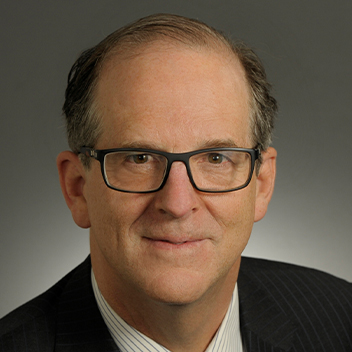 This is a professional head shot image of Robertson James.