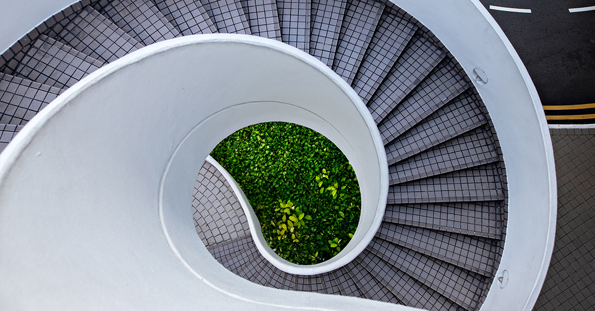 Top-down view of sleek, modern-looking spiral staircase 